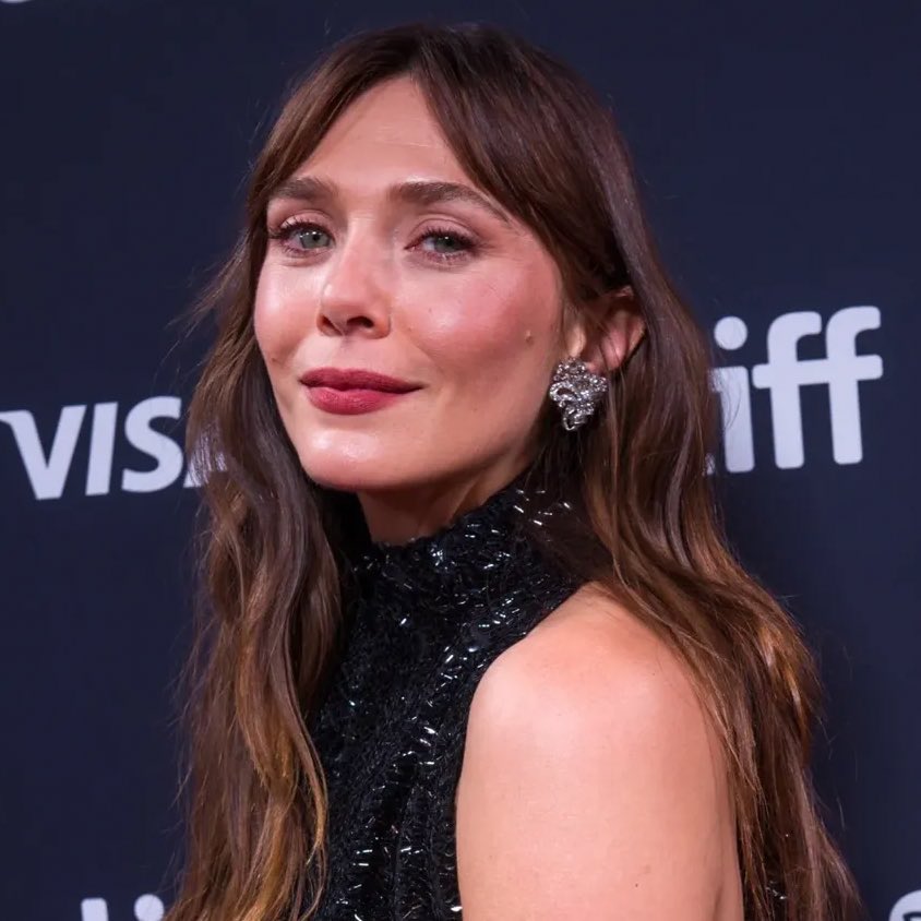 i need lizzie olsen to bend me over like a broken chair from ikea and fix me with her strap