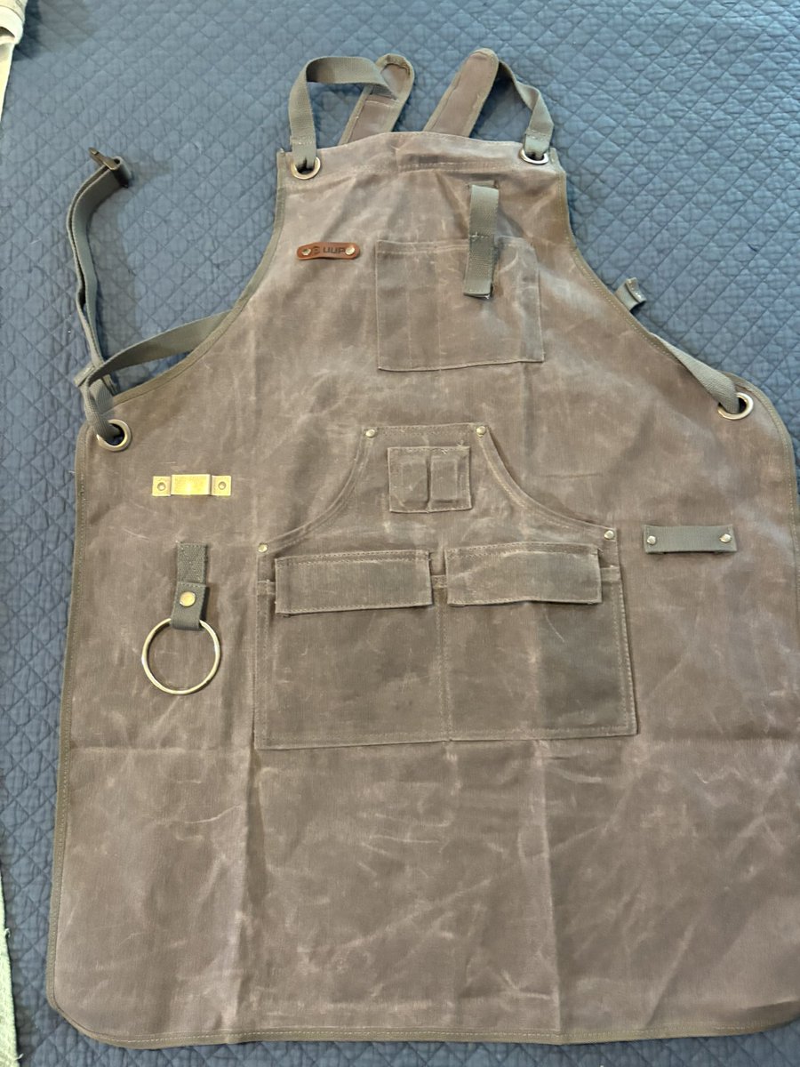 I was talking about the pleated pants. He LOVES the blacksmith apron. Behold.