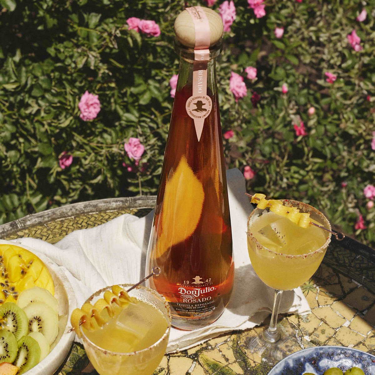 Finished in Ruby Port wine casks from the Douro wine region of Northern Portugal, this luxurious tequila is deliciously unique with a pink hue and tasting notes of sweet dried red fruit and caramel with a smooth finish. Discover Don Julio Rosado: bit.ly/48lciwG
