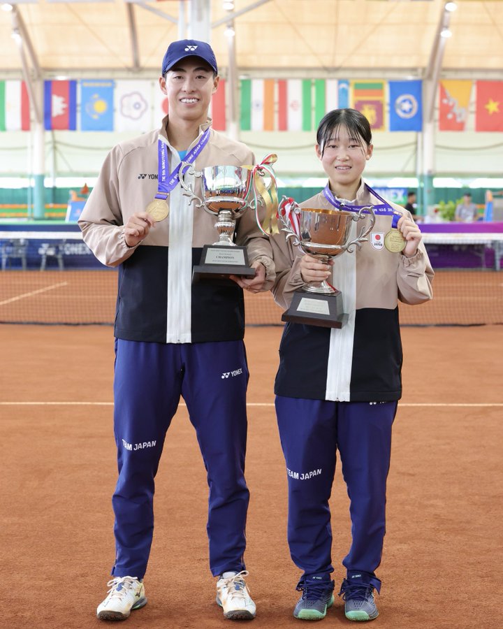 男女アベック優勝の写真（上松・天間）