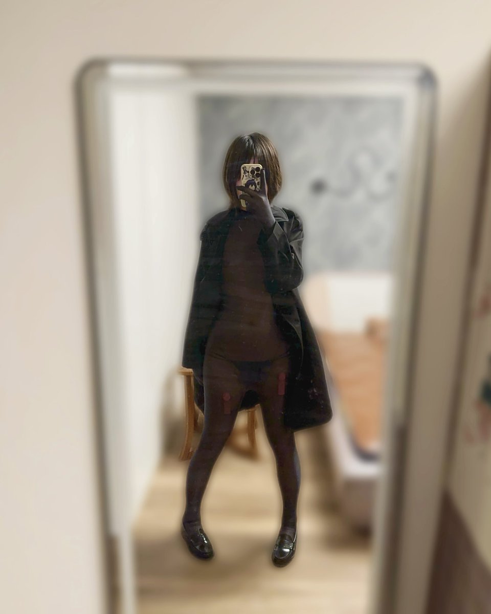 Late at night, girl on the red light district street