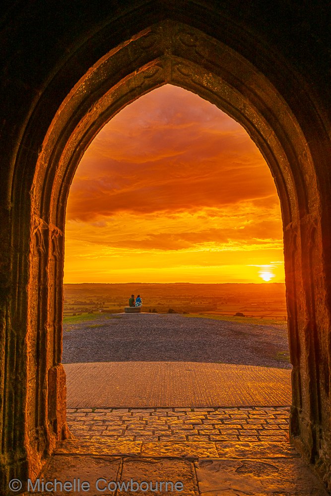 Glastomichelle's tweet photo. Golden sunrise from St Michael's tower on Glastonbury Tor. Photo taken on a sunny morning a little while ago. https://t.co/ouE9lIbMtm