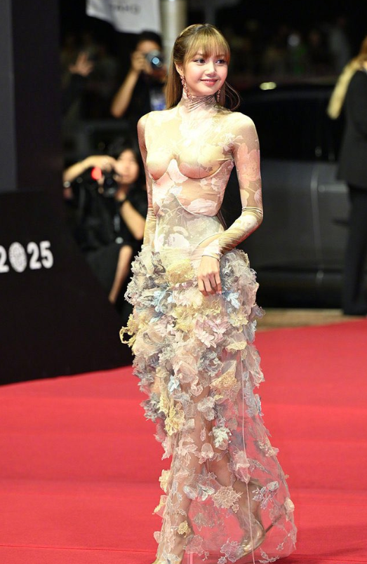 Lisa attends the Busan International Film Festival today.