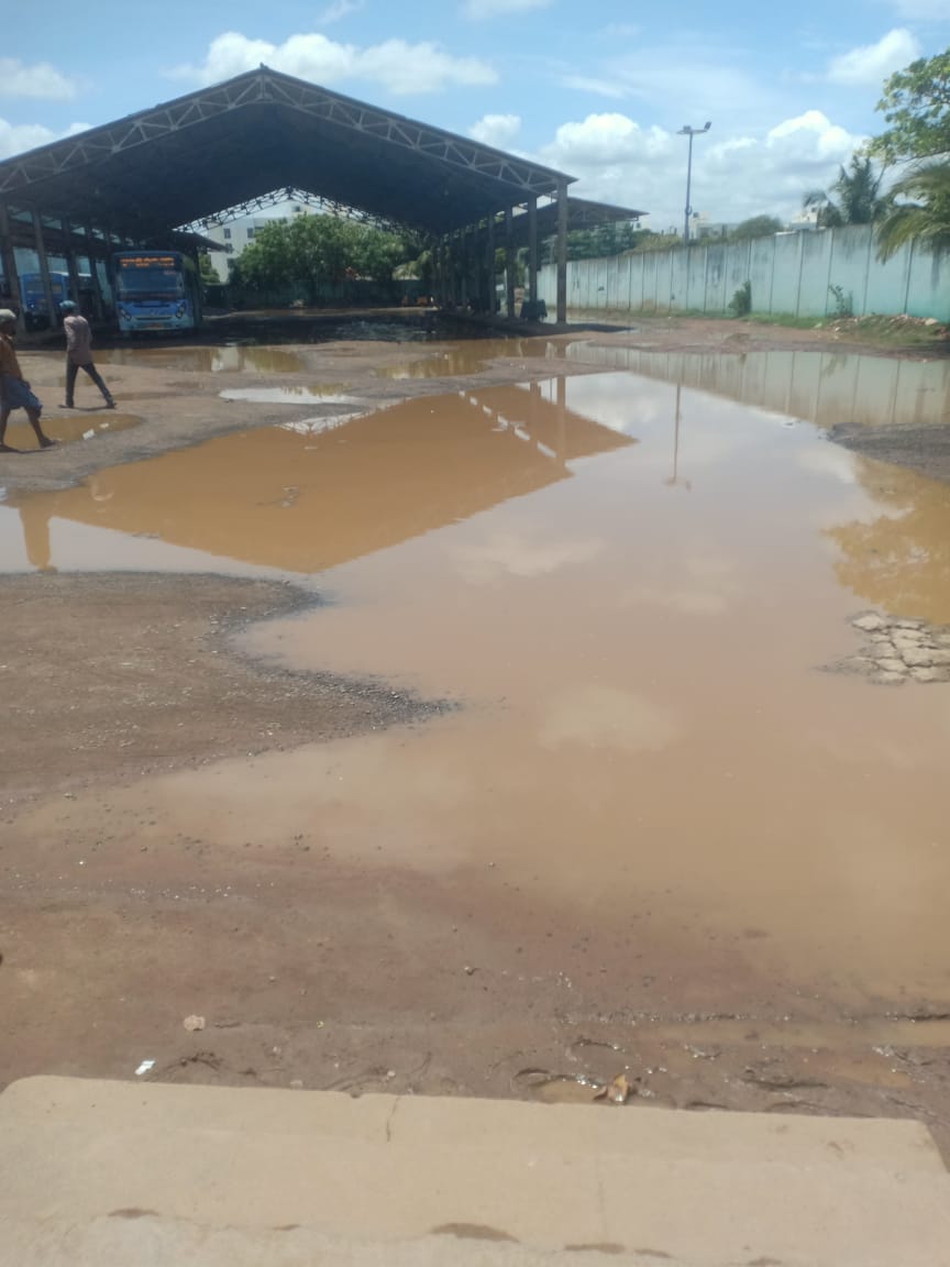 This is Kannagi Nagar Bus Depot, with stagnant rain water. People wait outside depot to board buses. Request concerned to level the surface with Cement or Bitumin. <a href="/CMOTamilnadu/">CMOTamilNadu</a> <a href="/S_AravindRamesh/">Aravind Ramesh</a> <a href="/ThamizhachiTh/">தமிழச்சி</a> <a href="/chennaicorp/">Greater Chennai Corporation</a> <a href="/TNUHDB_Official/">Tamil Nadu Urban Habitat Development Board</a> <a href="/MtcChennai/">MTC Chennai</a> <a href="/Subramanian_ma/">Ma Subramanian - தமிழ்நாட்டை தலைகுனிய விடமாட்டேன்</a> <a href="/Arappor/">Arappor Iyakkam</a>