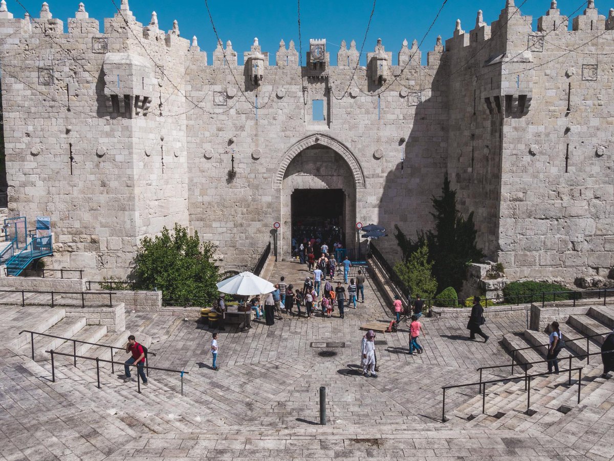 The Damascus Gate, Jerusalem. Photos taken 100 years apart. 

Built in 1537 by Sultan Suleiman the Magnificent, it stands on the site of earlier Roman &amp; Islamic gates. For centuries, it has been a main entrance to al-Quds and a gateway to reach Masjid al-Aqsa.