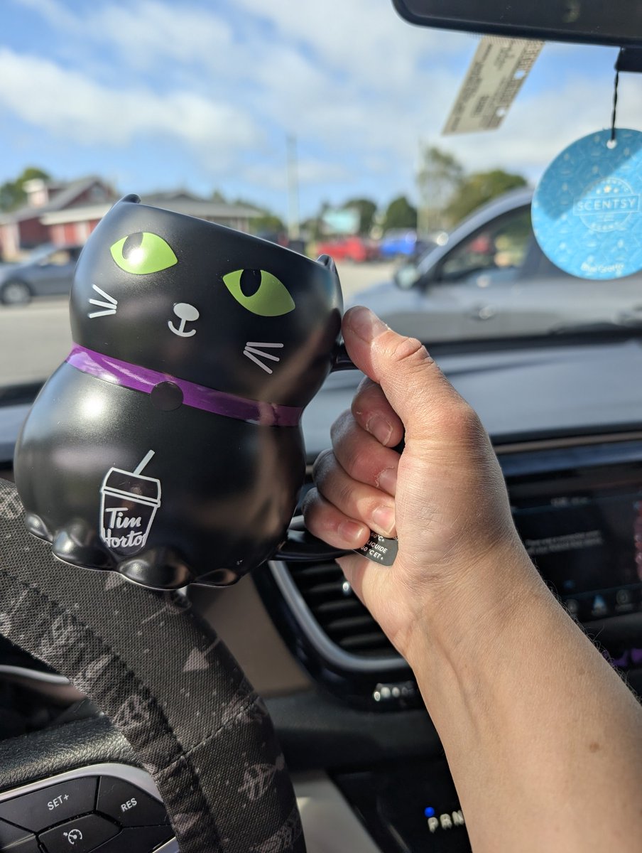 As a cat person, who also has black cats, the new Tim's mug is awesome! <a href="/TimHortons/">Tim Hortons</a>