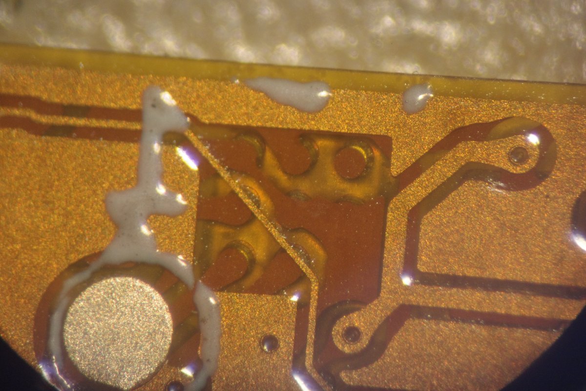 oldestasian's tweet image. If you're soldering BGA components on a flex PCB and don't have an x-ray machine to check proper joints, you can just leave a window in the ground pour to look at the pins afterwards