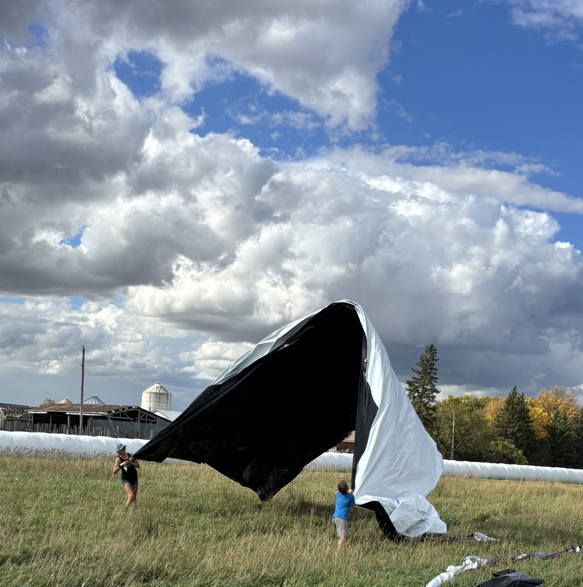 Kids got some good science class time after helping cover the silage pile. 😁