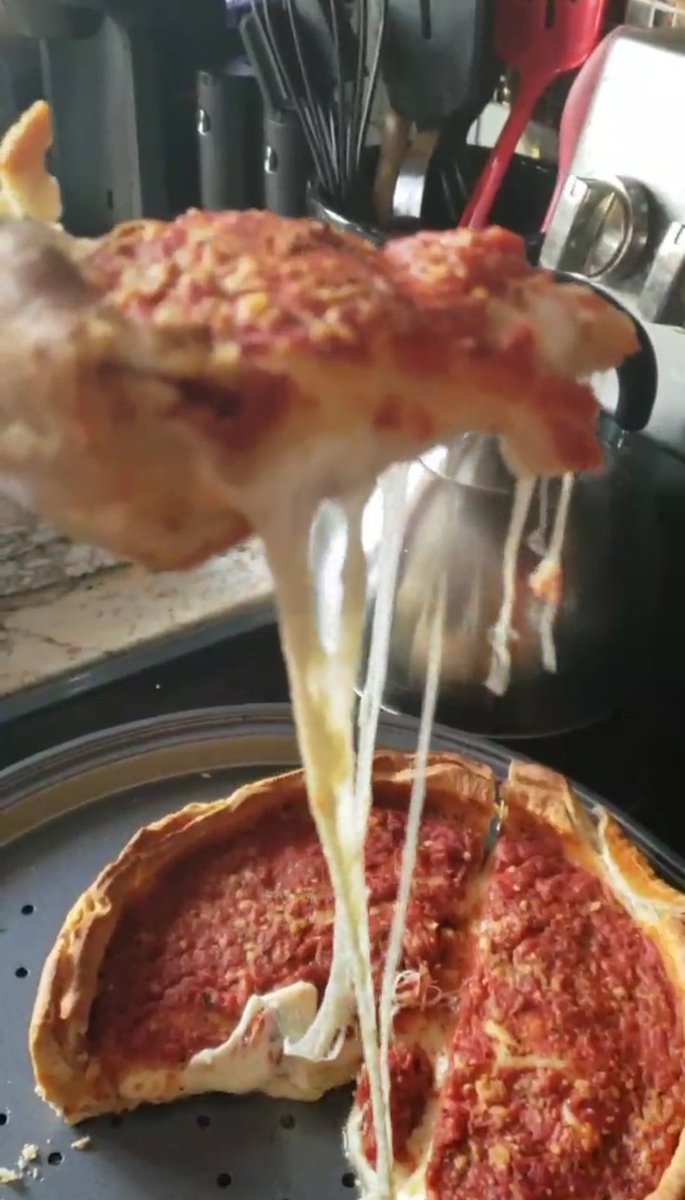 Deep dish tonight for dinner. Got that perfect cheese pull right out of the oven. ^^