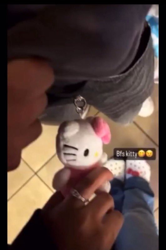 Grey pants..
Black sweater..
Hello Kitty sandals / slippers