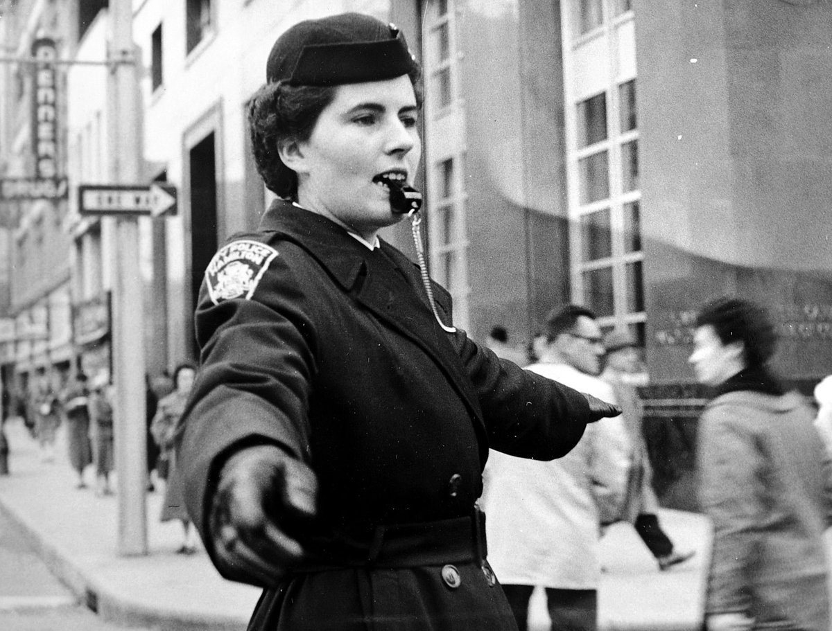 HPS_Museum's tweet photo. Delores Eitel directs traffic downtown ca 1959. #HPSArchives #PoliceHistory #HamOnt #HamOntHistory #HPSHistory #HPSMuseum https://t.co/FLw3tl7ZkZ