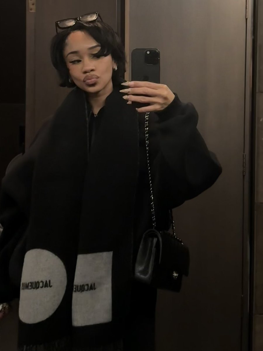 Saweetie's tweet image. 🐈‍⬛🪽✨