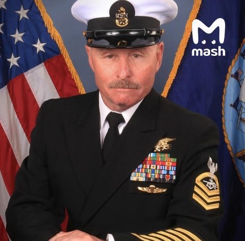 A naval officer in a dark uniform with medals, ribbons, and a white cap adorned with a gold emblem, standing in front of American and naval flags. A soldier in camouflage gear with a helmet, holding a rifle, sitting beside a vehicle with a backpack and gear. A person in a checkered shirt, helmet, and tactical vest labeled PRESS with medical patches, standing on a dirt path.