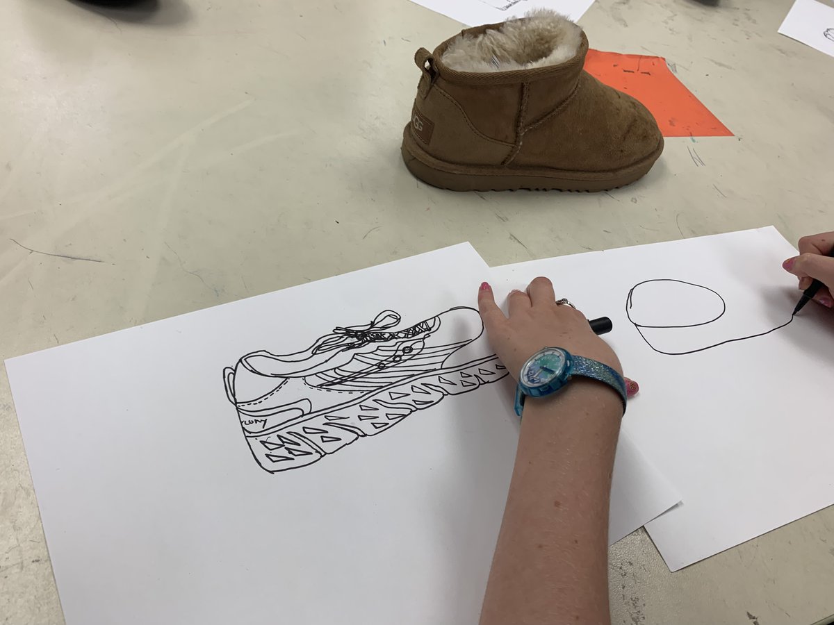 Elementary Art Class Project: Contour shoe drawings! Without raising their pen (mostly), students drew their own shoes on paper. This is elementary school, so, thankfully we were free of odiferous model offerings.