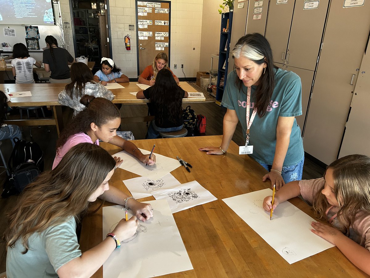 lmackay's tweet photo. Our amazing art teacher, Ms. Murello working with @SCIS_CCISD students to create posters celebrating a new round of astronaut candidates at NASA.  Student mentors helped with design ideas.   See the galaxy background?  Finished designs will be shared on Monday!  #STREAM https://t.co/pCcdZayJWS
