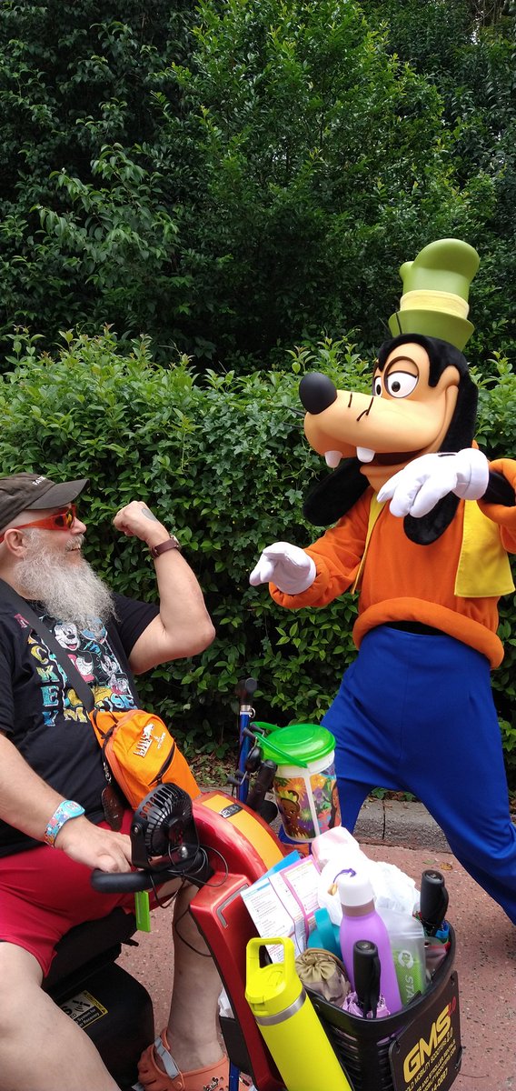 ToyBoxDave's tweet image. i met my hero today! no, i'm not threatening him, i'm showing him my goofy watch! he loved it! #goofy #goof #friendship #friend