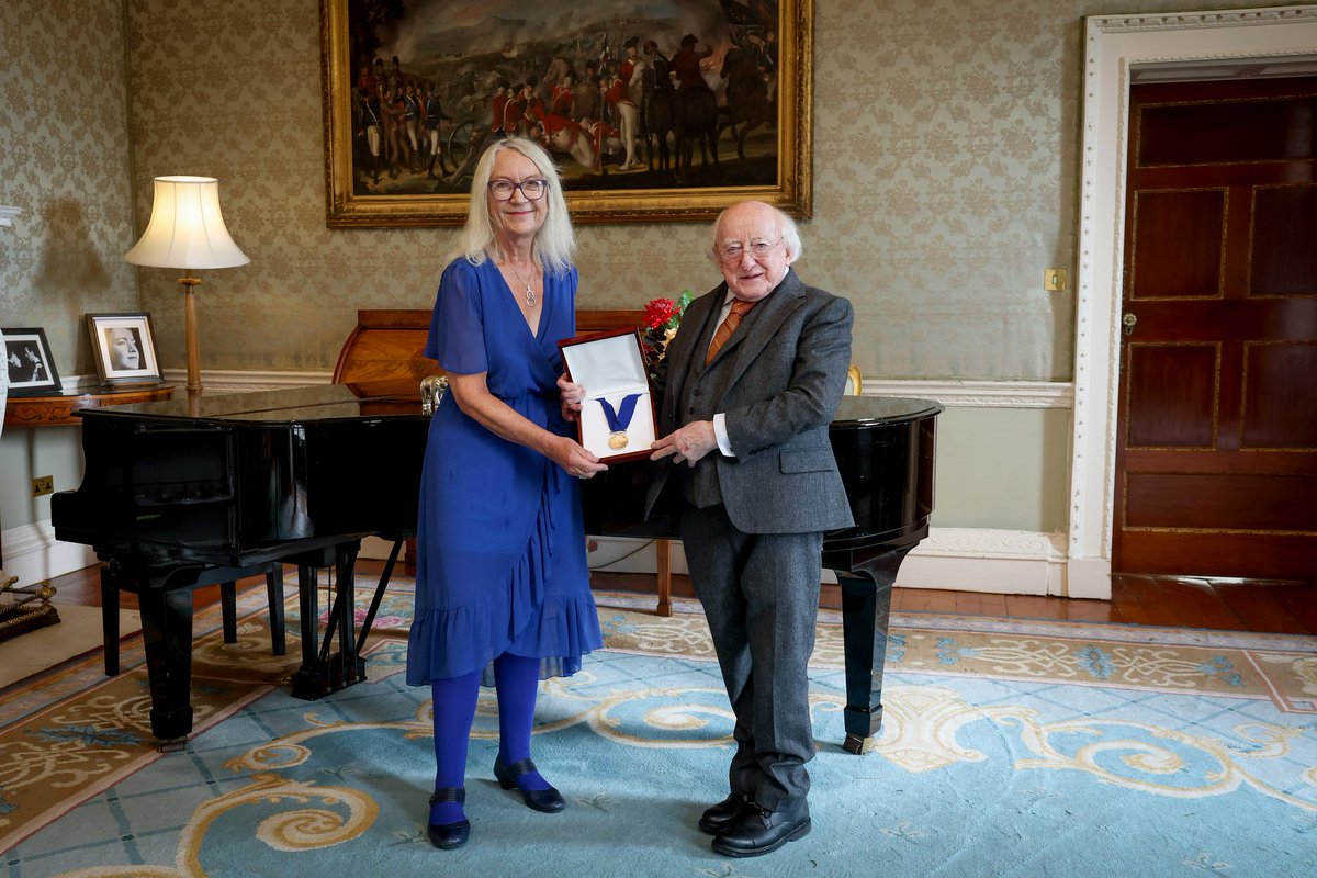 LaureateFiction's tweet image. President of Ireland / Uachtarán na hÉireann Michael D. Higgins, this afternoon presented Éilís Ní Dhuibhne with the Laureate for Irish Fiction medal to mark her appointment as the fourth Laureate.
During her three year term from 2025 – 2028 she will deliver an annual public…