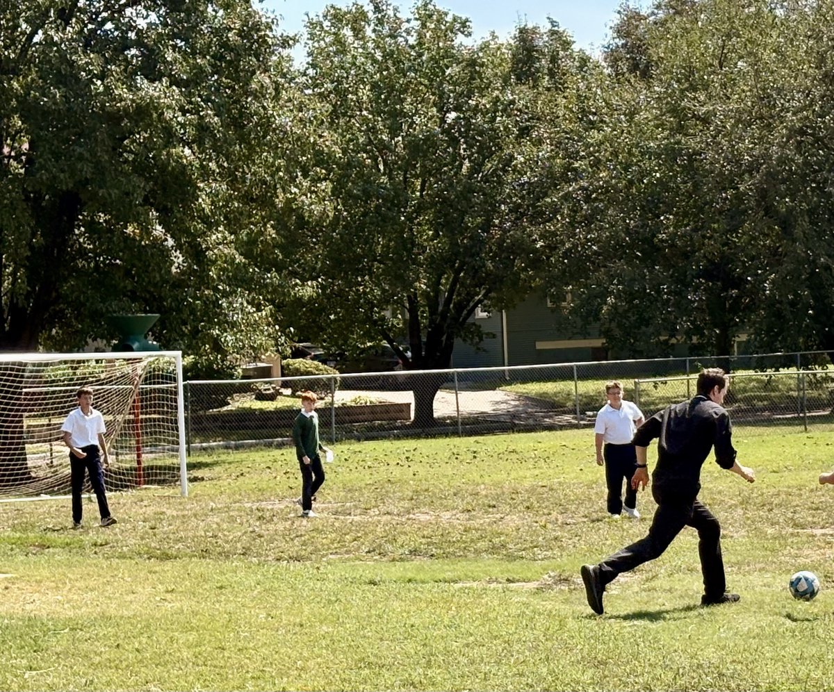 It was nice to have a break from the rain for some fun recess games of basketball and soccer.  We didn't get a final score, but Fr. Joseph sure had fun with the students!