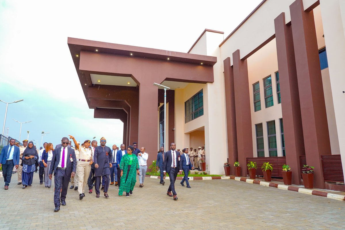 BTOofficial's tweet photo. This morning, alongside the Permanent Secretary, Dr. Magdalene Ajani, and the Comptroller General of the Nigeria Immigration Service (NIS), Kemi Nanna Nandap, I inspected the newly-built Centralised Passport Personalisation Centre at the NIS headquarters in Abuja.

Together with journalists from various newsrooms, we toured the new facility with detailed explanations from technical partners who walked us through every unit.

As the Minister of Interior, I make bold to say that the #RenewedHope of President @officialABAT Tinubu (GCFR) has lived up to its promise of transparency and accountability, and with this new facility housing high-speed machines, Nigerians can be assured that our passport production capability has just gotten better. 

With these strategic infrastructural investment, which did not cost a kobo to the government, the NIS can now personalise over 1,000 passports in one hour. 

To put it into perspective, long before this development, the service can only record an average of 250–300 passports daily. But, today, under 5 work hours, the service can now deliver about 4500 to 5000 passports.

As a major milestone, for the first time in 62 years of the service, this centralisation puts an end to the production of our passports at multiple centres across the world. 

It is equally important to note that this development will help us deliver passports faster to applicants and drastically cut down on waiting time in our bid to put an end to needless delays that once riddled the passport acquisition process.