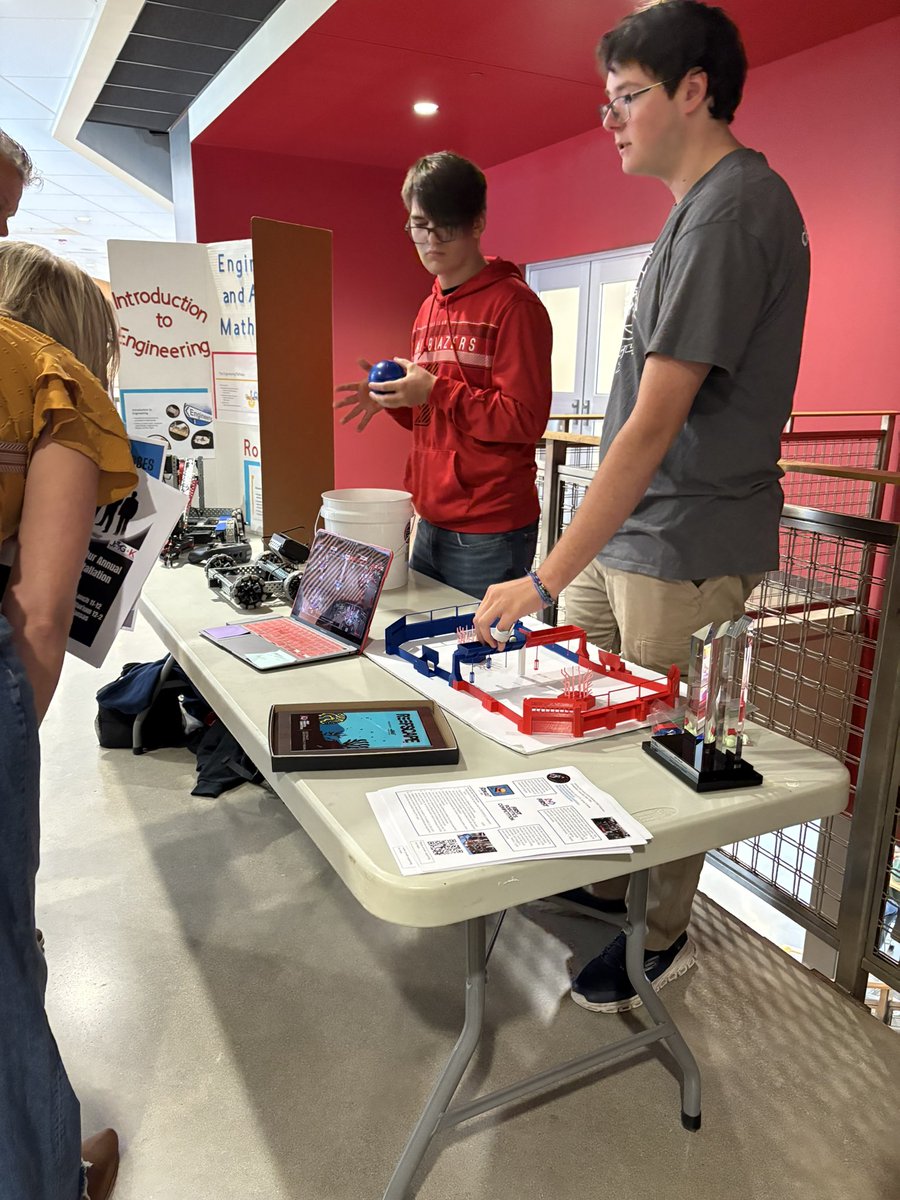 Two Robotics students talking about Robotics with community members at the Bridge to Success: Apprenticeship Summit. @lansing_high_school_469 @first_official_  #stemeducation✏️ #robotics #careertechnicaleducation <a href="/Clearwave_Fiber/">Clearwave Fiber</a> <a href="/usd469/">Lansing USD 469</a>