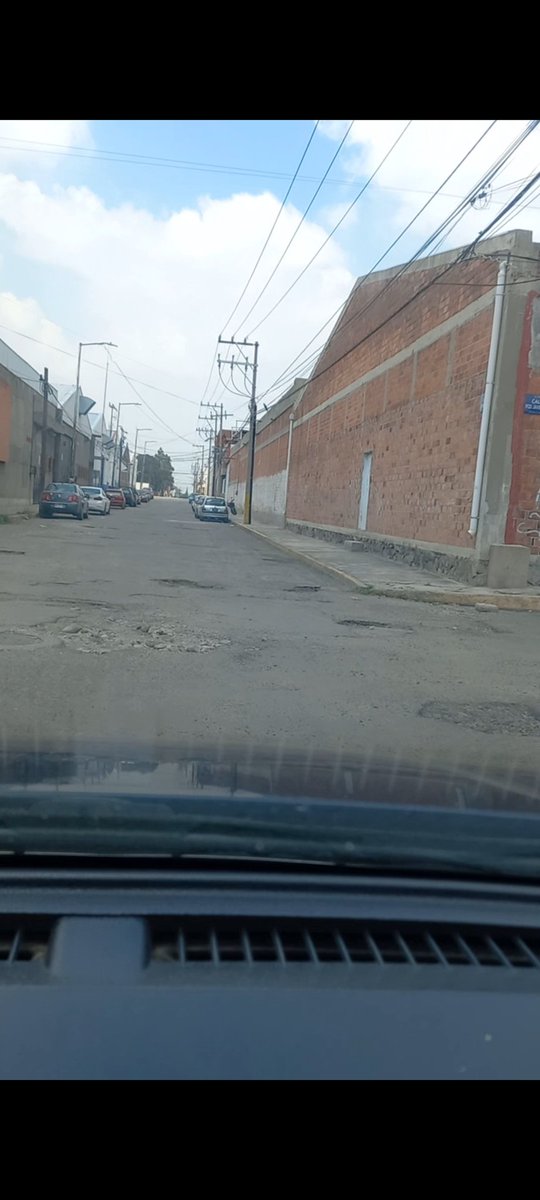 racs2064's tweet photo. @InfraPue @PueblaAyto @laredcincoradio @carlosmartinh  Más baches en Calle Corregidora entre calzada I. Zaragoza y boulevard Ayuntamiento col. Tepeyac. https://t.co/bFmjQ0P2JK