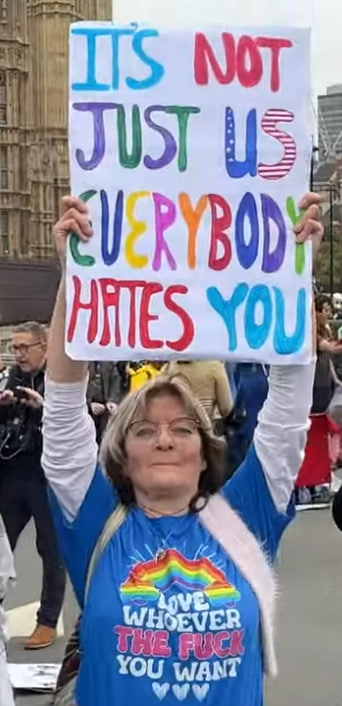 Entropy72's tweet image. Read her shirt.