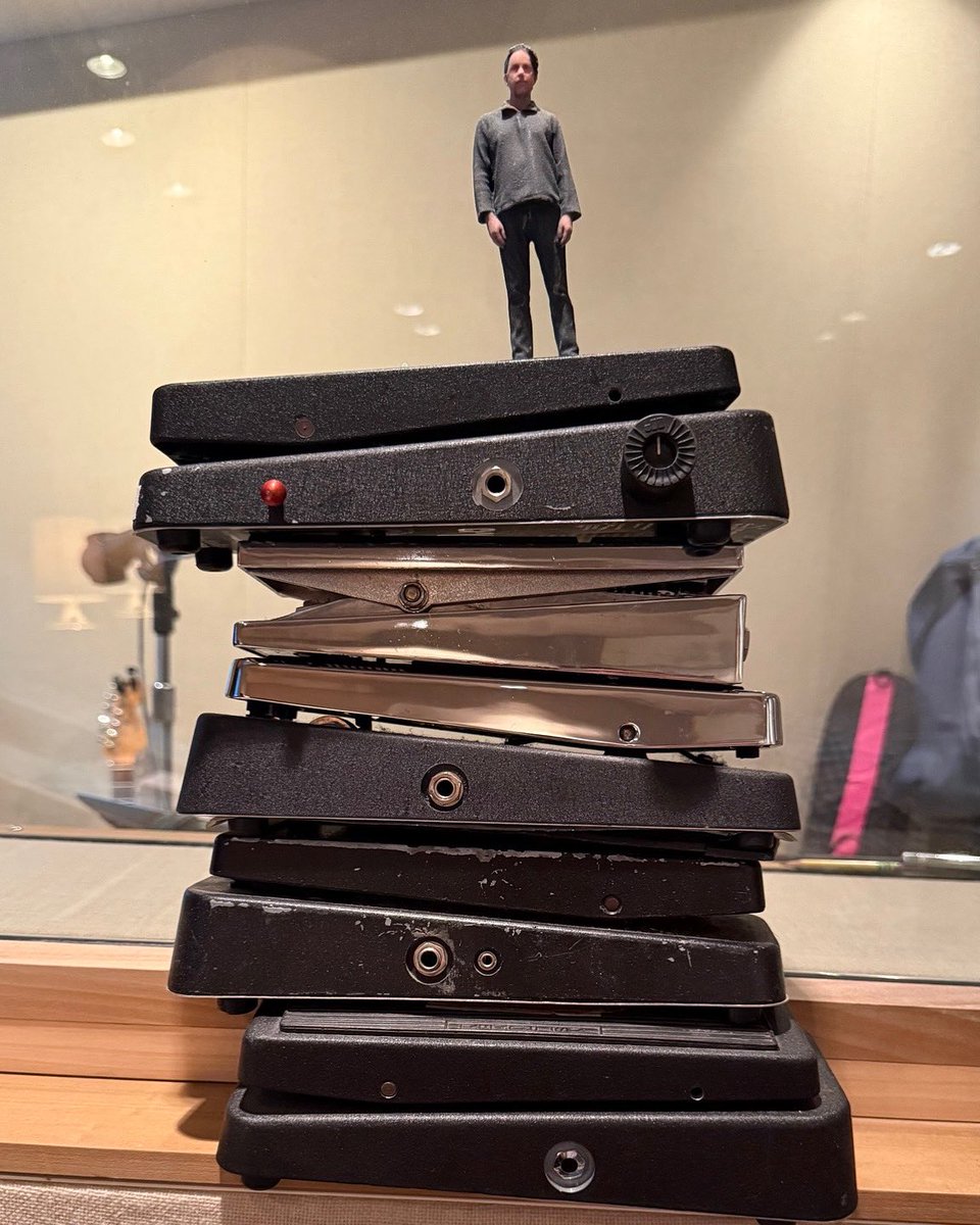 tmbg's tweet image. John Linnell standing on his famous pillar of wah wah pedals. #NewAlbum