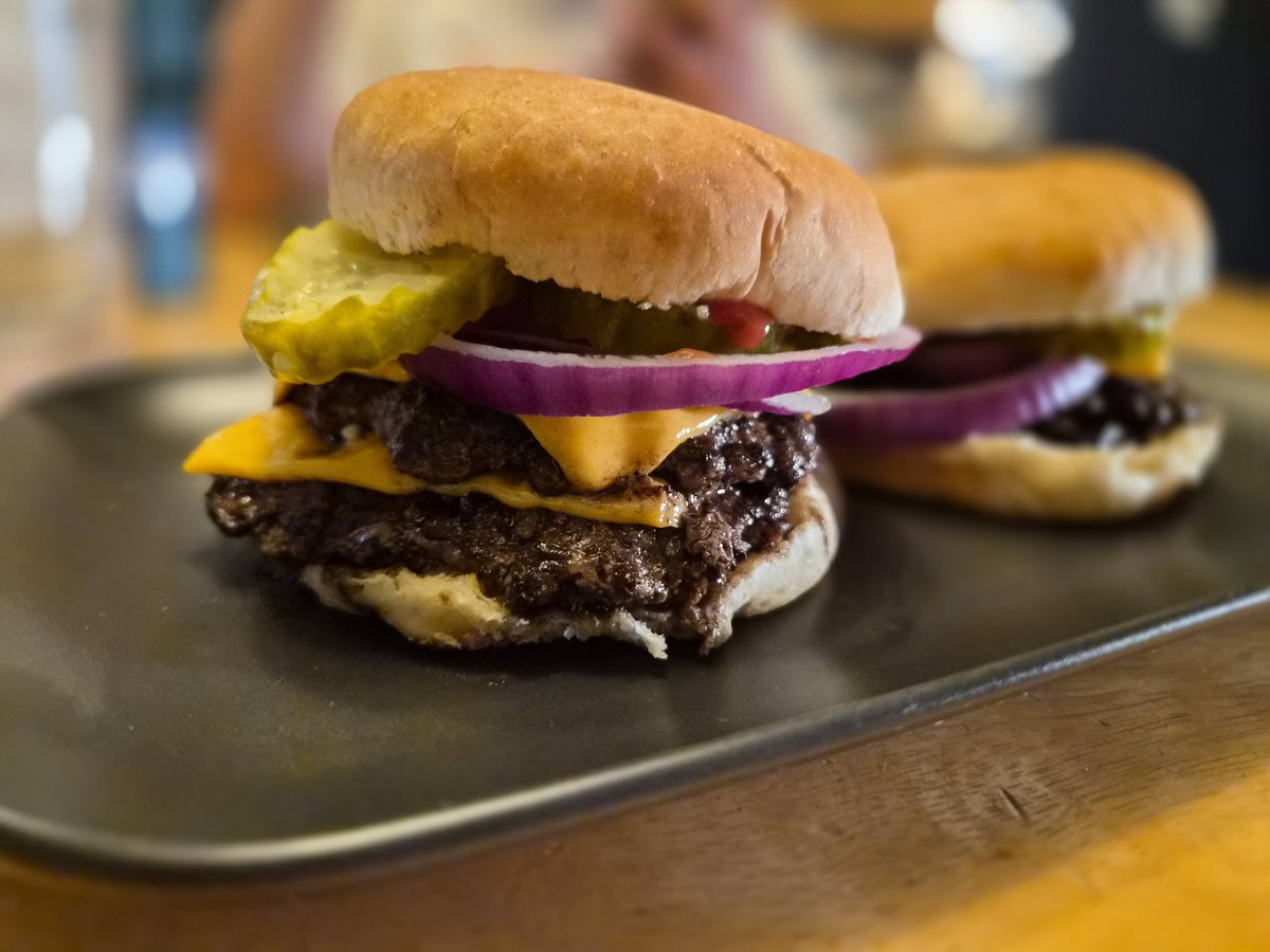 TimmyHallRadio's tweet photo. #CheeseburgerDay a couple of good clean burgers. With Division III pickles! It is goooooood!!!! https://t.co/F8bfRJcQur