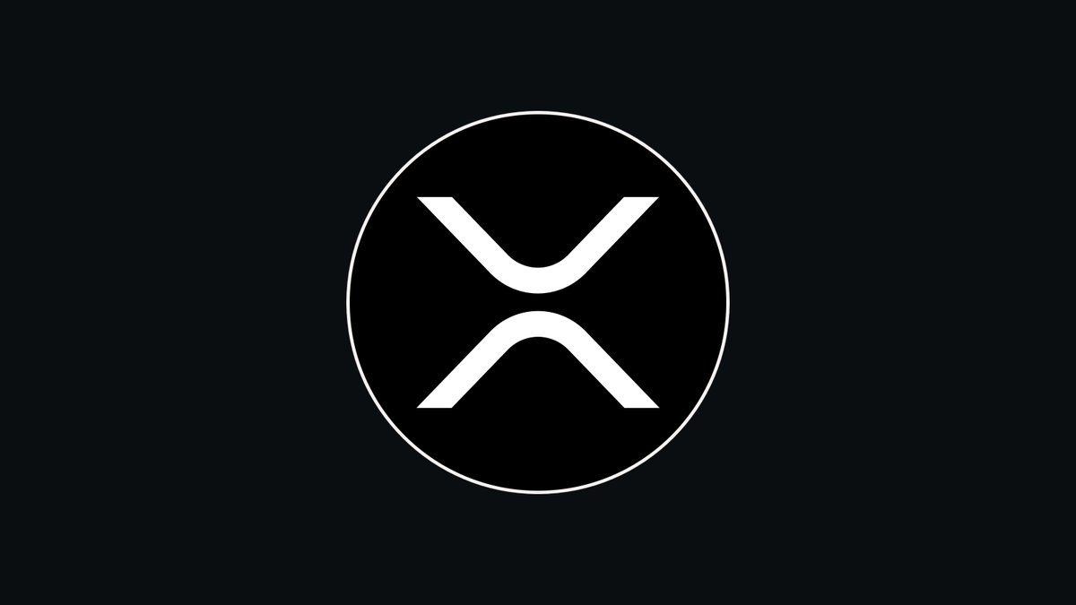 黒背景に映えるXRPのロゴ