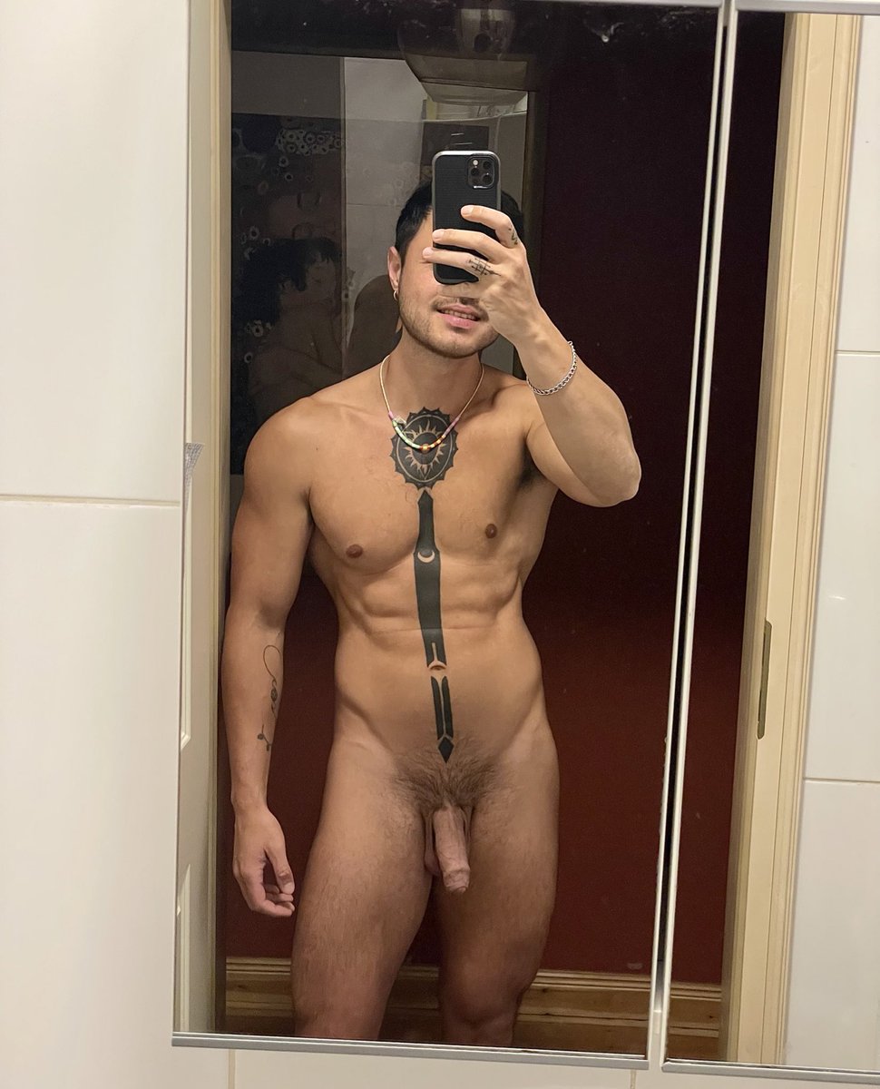 a flicker of mischief in his eyes as he teases the camera