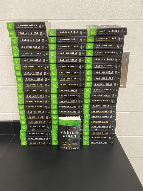 Mrs. Bertke's Advanced 8th Grade Science class working on their Obscertainer lab yesterday and beginning their nonfiction independent book study today on The Radium Girls.