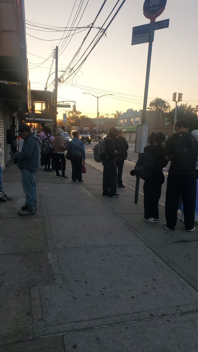 XmasGreen's tweet photo. @GovKathyHochul @MTA how's that redesign going?  All waiting for a Q110 Jamaica bound bus to be packed like sardines just because we live in a poor neighborhood! https://t.co/IB4epYmgCl