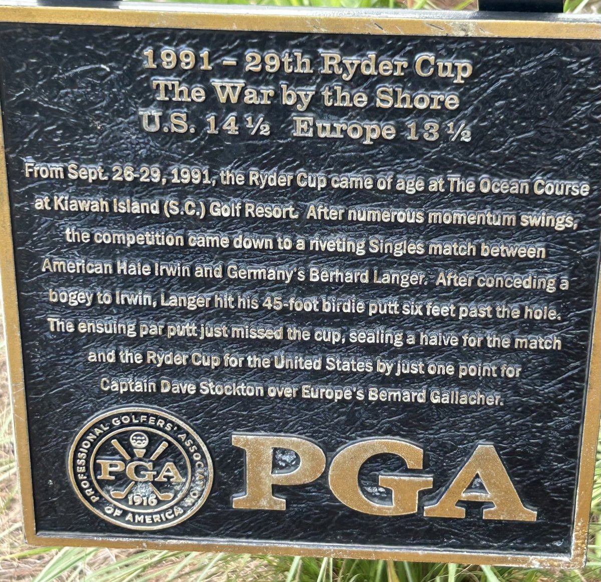 Countdown to the <a href="/rydercup/">Ryder Cup</a> from The Ryder Course <a href="/PGAVillage/">PGA Golf Club at PGA Village</a> where the hole sign on #12 depicts ‘The War by the Shore’ at Kiawah - epic!