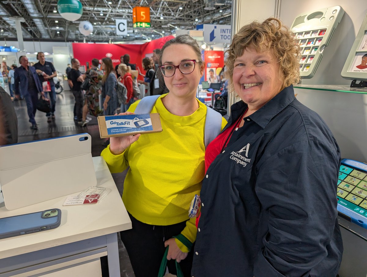 1) Joni shares her love for the GoTalk Select (attainmentcompany.com/gotalk-select) with SLP's at #REHACARE in Düsseldorf, Germany. 2) A parent is thrilled to win a GoTalk Fit (attainmentcompany.com/gotalk-fit) to help her child communicate😃