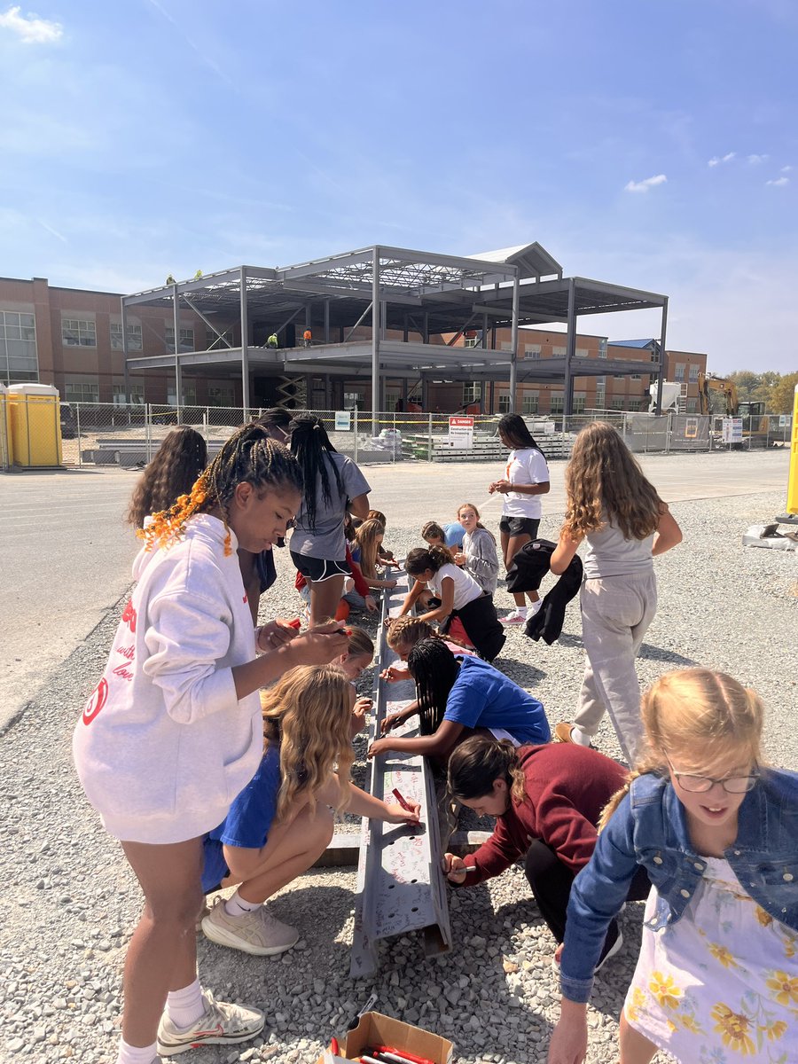 Students got to sign one of the beams that will part of our new construction.