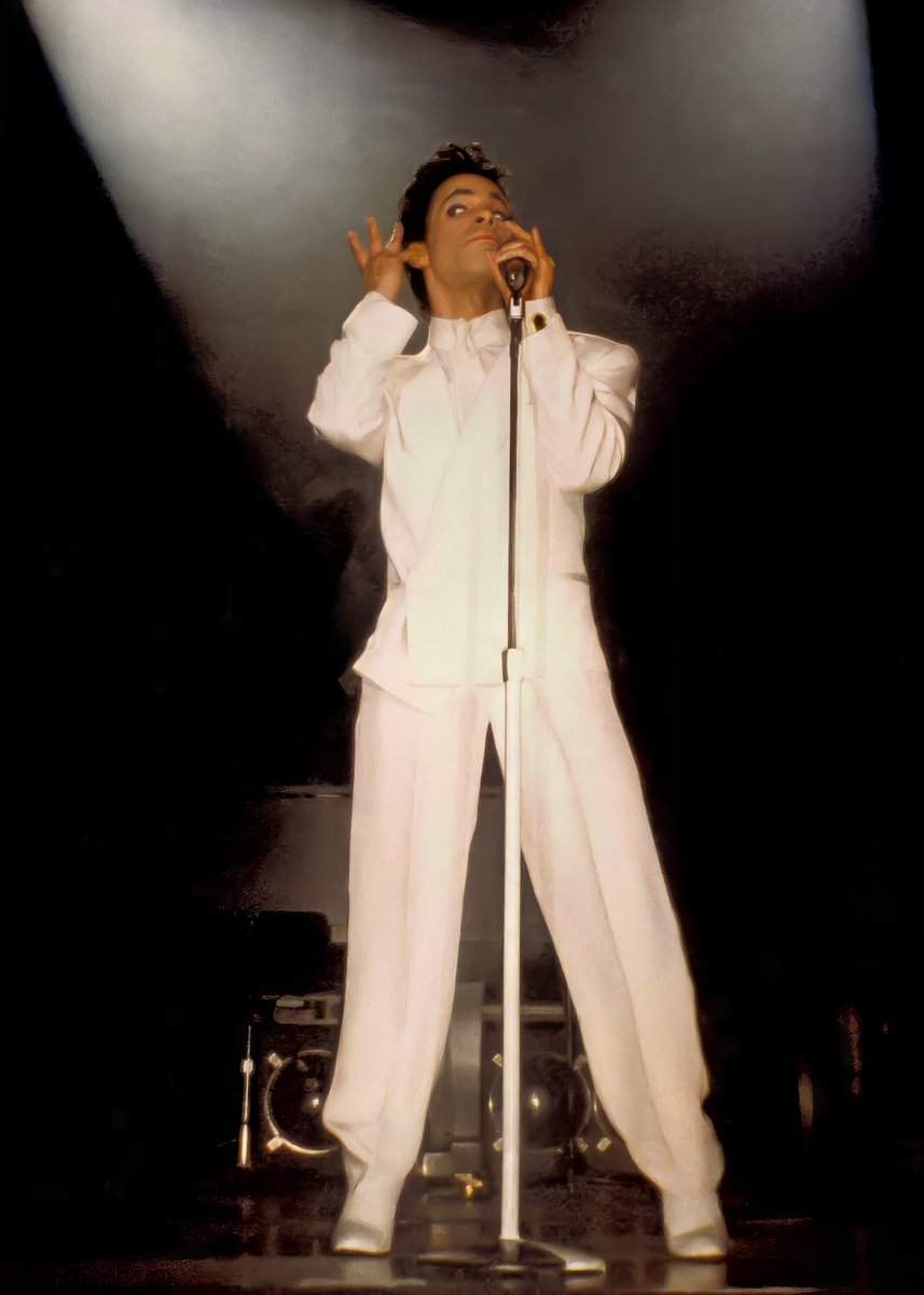A-U-T omatic! The all white look came out 3 times on the tour. I took this on the last night in London. That night, along with the Stockholm, were absolute highlights of the tour and seemed to be the ones Prince and the band enjoyed the most.