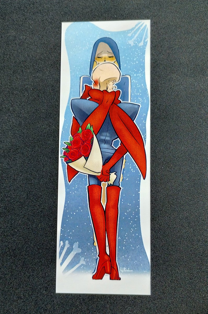 The proofs of our bookmark, omamori, and calendar insert are here!

We are still testing the omamori origami, but take a look at the photos of our bookmark and calendar insert! 🦴💙🦴🧡🦴