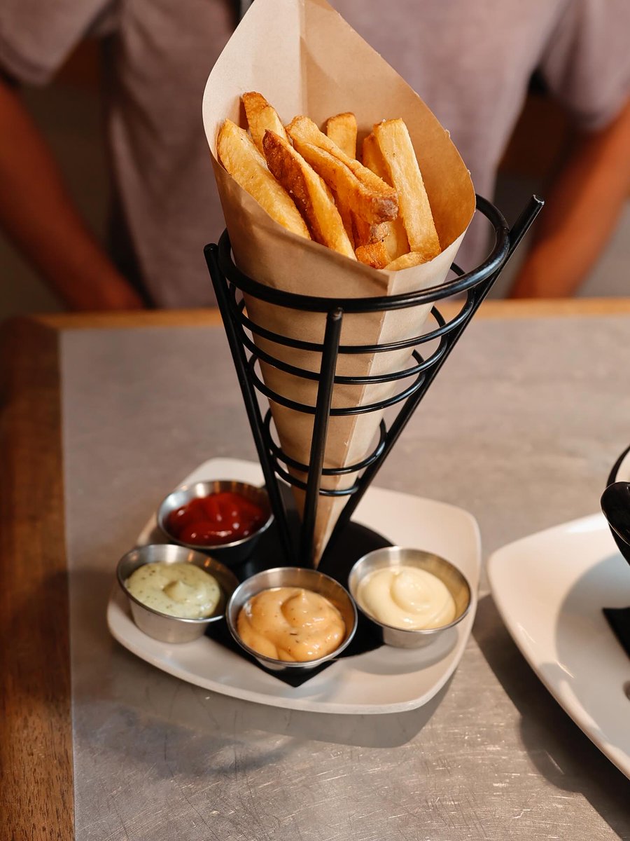 TheBanksCincy's tweet image. ✨ Friday calls for crispy perfection! ✨

@tasteofbelgium's classic frites with their signature dipping sauces are the ultimate start to the weekend! 🍟🇧🇪 Which sauce are you reaching for first?  #FryDay