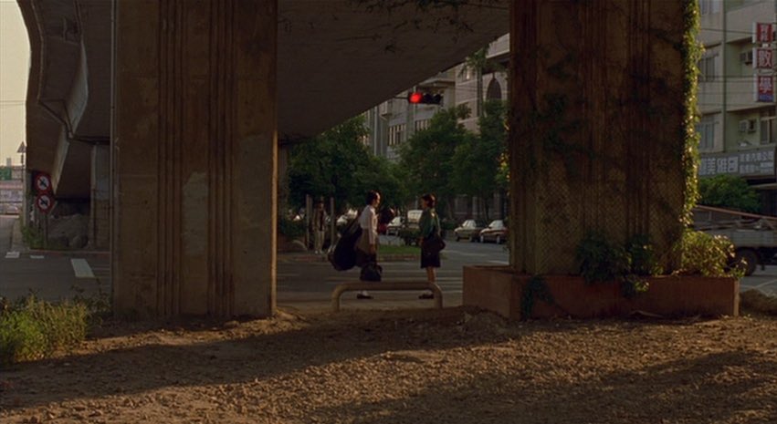 LostInFilm's tweet photo. The precise framing through windows, mirrors and urban elements in Edward Yang's 'Yi Yi' (2000) https://t.co/EfIM7JOAb6