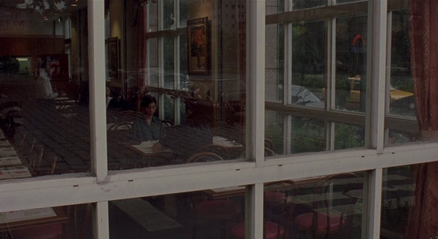 LostInFilm's tweet photo. The precise framing through windows, mirrors and urban elements in Edward Yang's 'Yi Yi' (2000) https://t.co/EfIM7JOAb6