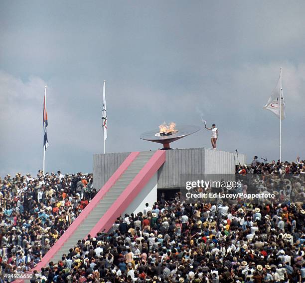 On this day in 1968, the Olympic flame was lit in Mexico City as the Games of the XIX Olympiad officially opened — the first Olympics ever held in Latin America, and the highest in altitude at 2,240 metres above sea level.

The opening ceremony at Estadio Olímpico Universitario