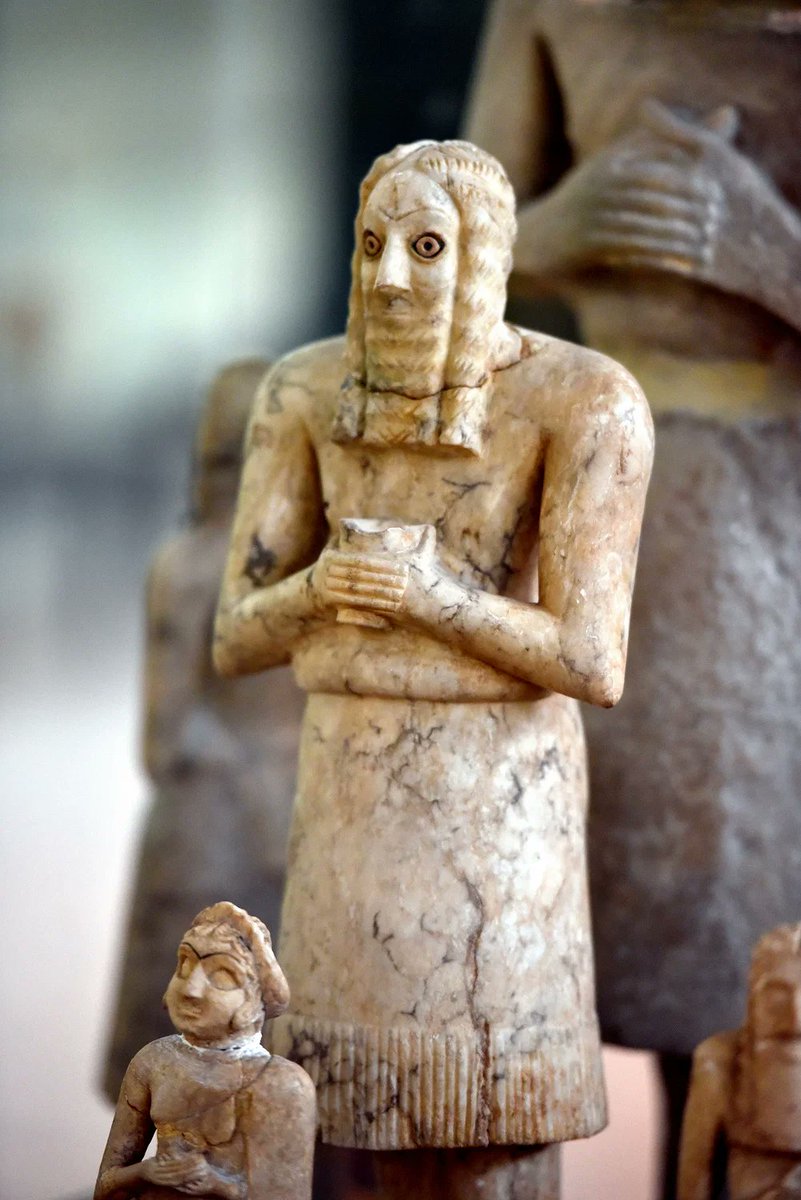 This is a votive statuette of a Sumerian male worshipper from the square temple of Abu in Tell Asmar (ancient Eshnunna, Mesopotamia, Iraq), III early Dynastic period, 2600-2400 BC. e.