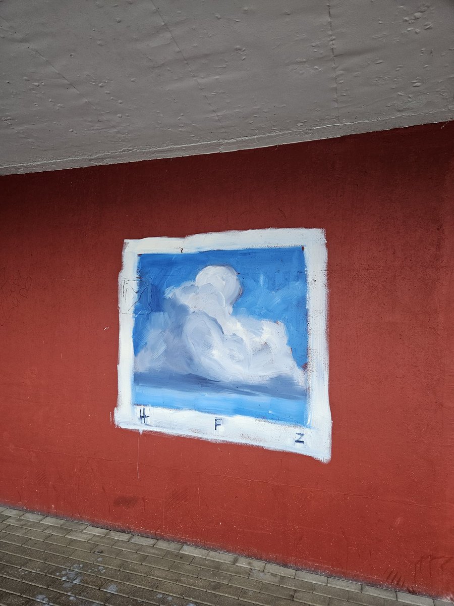 Grafiti ar mākslinieka piesitienu