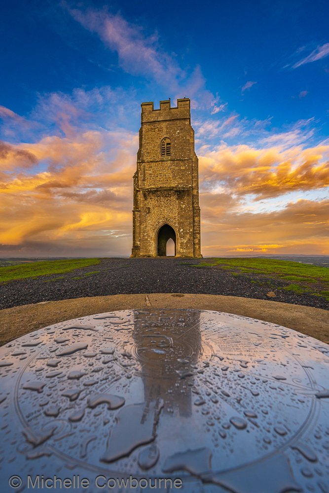 Raindrops on the compass stone. Photo taken on Glastonbury Tor.