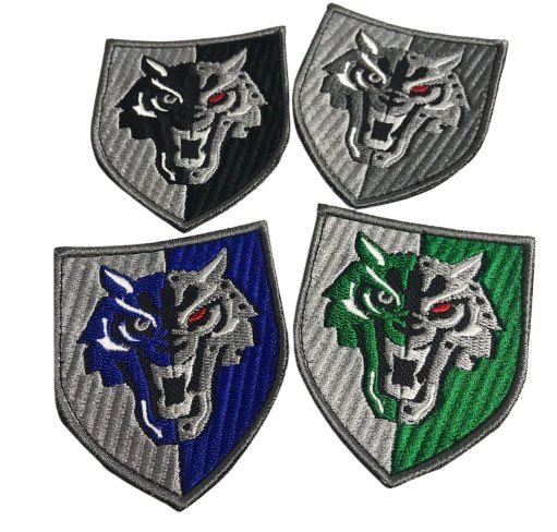 Patch embroidery variations: examples of the 4 x Ukrainian PSYOPS Centres. 

Traditional grey and coloured halves with a central psi wolf. 

The interesting variation here is the use of the corresponding colour mirrored in the left hand side facial detail. 
All 4 WANTED
🇺🇦🫡👻📢