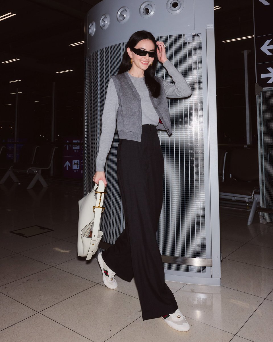 gucci's tweet photo. On her way to Milan for a special #Gucci event, Brand Ambassador @DavikaH is spotted in a look from #GucciPreFall25, styled with the new #GucciBeatrix handbag and #GucciShift sneakers. #DavikaHoorne #MFW https://t.co/MGIIleg6em