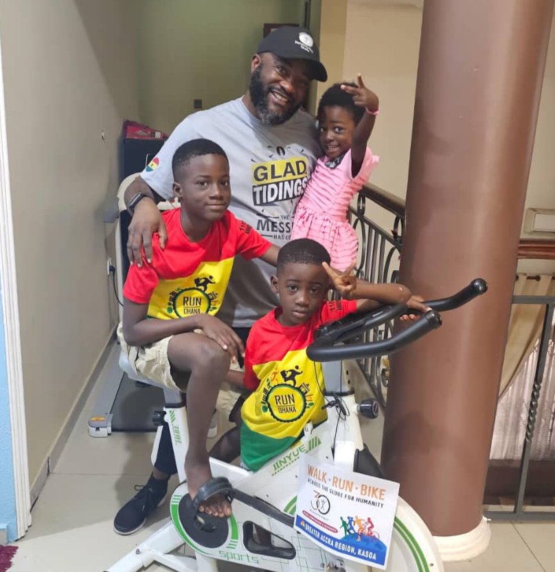 HF_Ghana's tweet photo. Leading by example. A volunteer rides alongside his kids for the #WalkRunBike campaign, turning family time into a powerful moment of purpose and unity. #ServingMankind #MilesThatMatter #HumanityFirst30 #Ghana https://t.co/3Iq9WcAsJ6