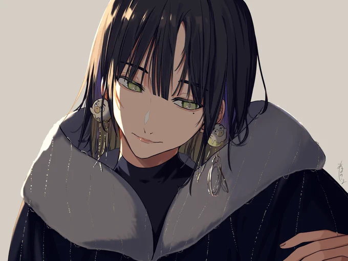 大きい服着た男の子。