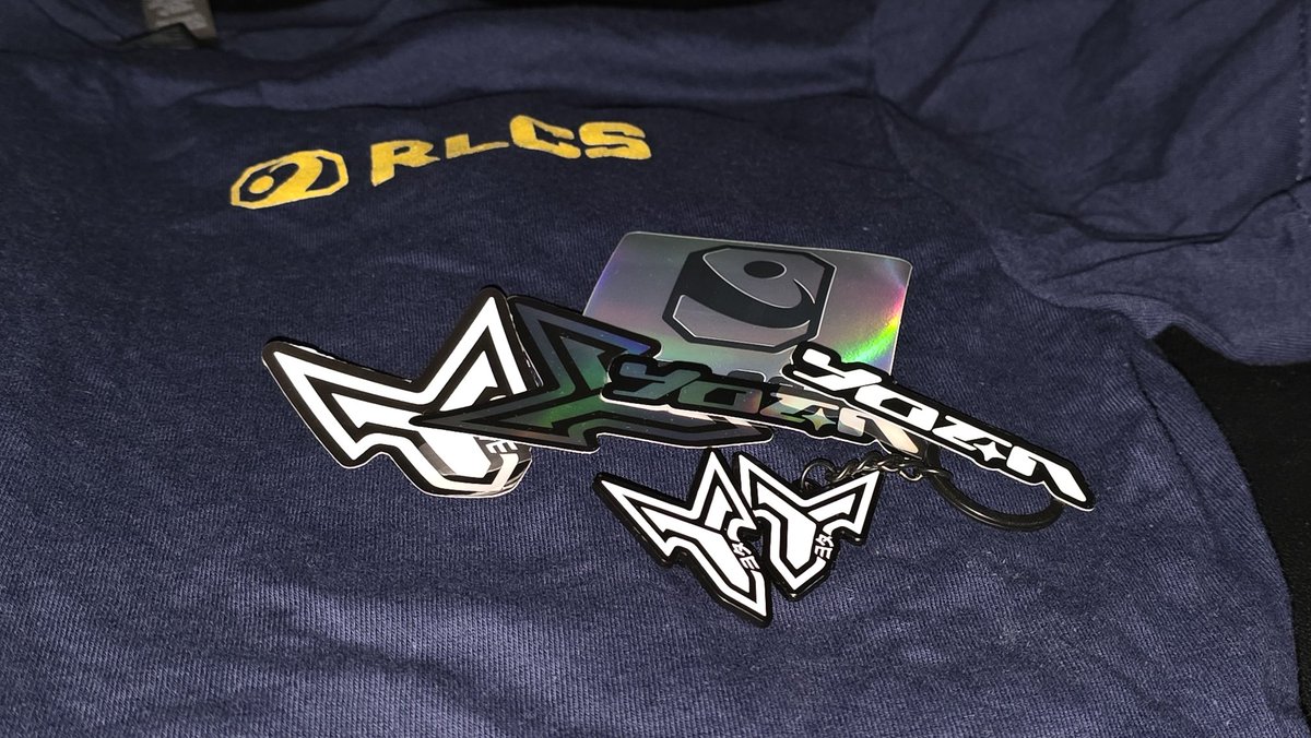 RocketYota's tweet image. 🚨Rocket League RLCS25 + Yota Merch giveaway 🚨

This includes:
- Worlds 2025 T-shirt 
- RLCS Sticker (holo)
- Yota text sticker (holo and regular)
- Yota logo sticker (holo and regular)
- Yota key chain &amp;amp; pin

To enter:
- Follow like and retweet
- Tag a friend + your shirt size…