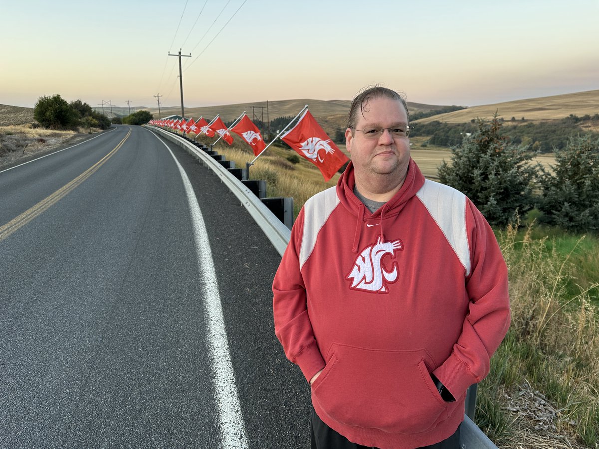 WSUPullman's tweet image. This morning, Andrew Foss (’06, Hospitality Business Management) continued a tradition of showing off Cougar pride by placing #WSU flags outside his home, a few miles southwest of Pullman. “I started with American flags on #4thofJuly and #MemorialDay, and after some time doing